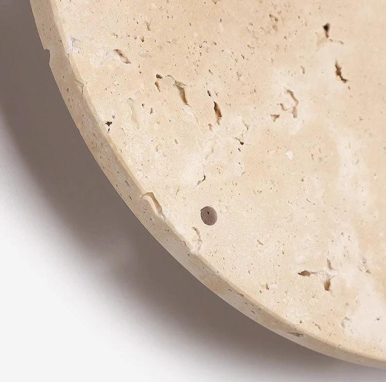 Awaken your space with the Wabi-sabi wall clock made of travertine by BowLift
